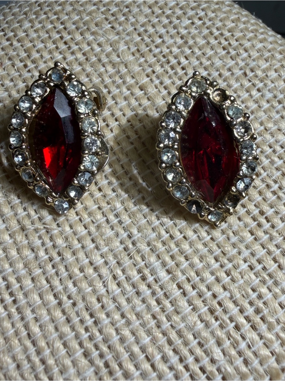 Carnegie Gold tone Clip On Earrings with Deep Red stone sparkling clear stones